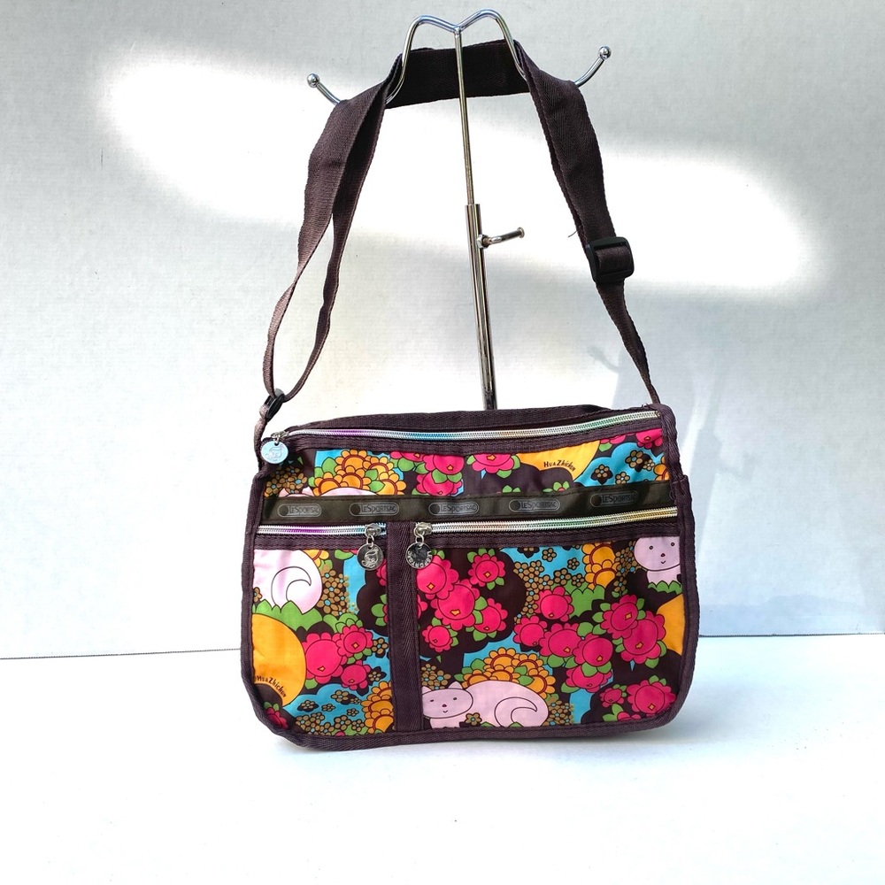 Lightweight crossbody bag in brown and multicolored floral cat print nylon